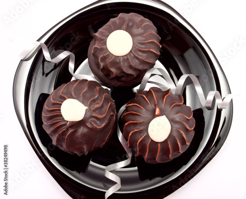 Photo: The three chocolate cakes on the plate The three chocolate cakes on the plate