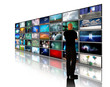 Illustration: Man viewing video displays Man viewing video displays