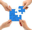 Hands and puzzle