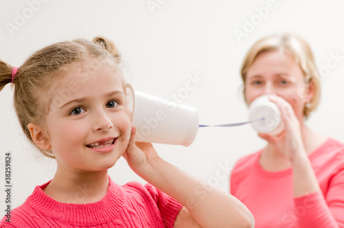 Foto: Communication - playing with mug phone Communication - playing with mug phone