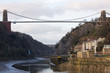 Brunels landmark Clifton suspension bridge at low tide in winter