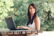 Photo: beautiful girl studying at the park beautiful girl studying at the park