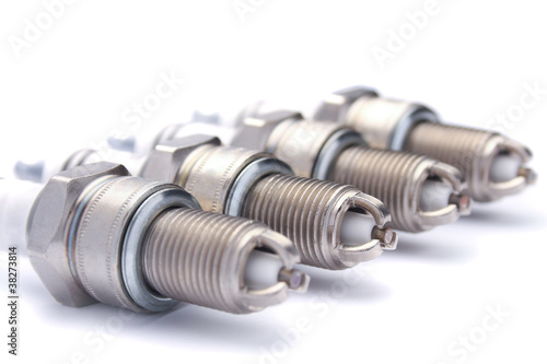 Photo: Four spark plugs for car's engine Four spark plugs for car's engine