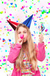 girl with party hats and party horn blower