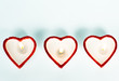 Three heart-shaped candles