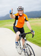 happy senior male bicyclist giving thumb up