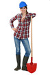 portrait of female bricklayer with arm resting on shovel