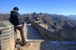 Beautiful girl standing on the Great Wall of China - Simatai