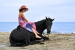 Foto: cheval couché et sa cavalière cheval couché et sa cavalière