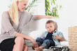 Woman sitting with a little boy