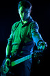 Photo: Bassist Tuning His Bass During a Concert Bassist Tuning His Bass During a Concert