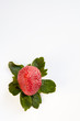 Photo: Strawberry from Above with Green Leaves Strawberry from Above with Green Leaves
