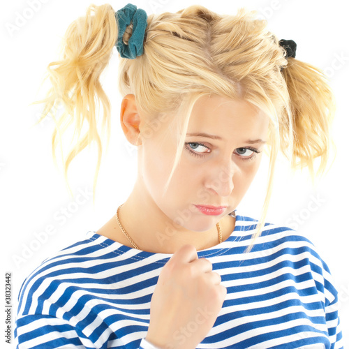 Photo: Woman with a funny look on her face smiles Woman with a funny look on her face smiles