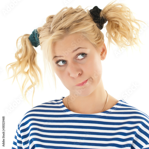 Photo: Woman with a funny look on her face smiles Woman with a funny look on her face smiles