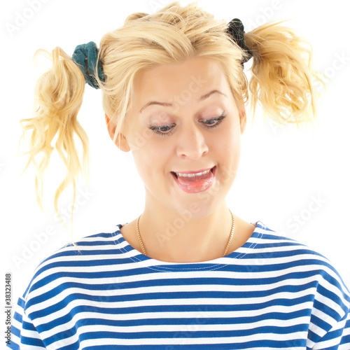 Photo: Woman with a funny look on her face smiles Woman with a funny look on her face smiles