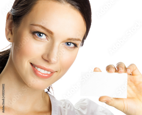 Photo: Businesswoman giving business card, isolated Businesswoman giving business card, isolated