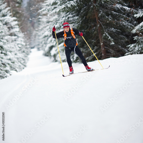 Photo: Cross-country skiing: young man cross-country skiing Cross-country skiing: young man cross-country skiing