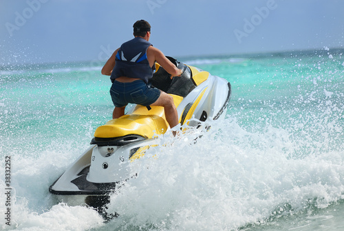 Photo: man drive on the jetski man drive on the jetski