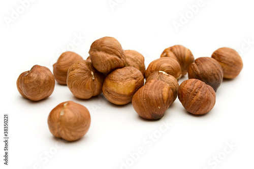 Photo: Hazelnuts on the white background Hazelnuts on the white background