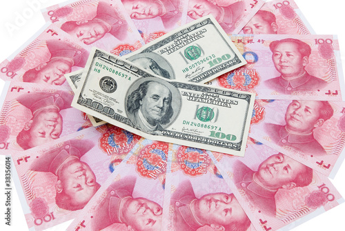 Photo: US dollars and RMB yuan US dollars and RMB yuan