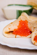 Photo: pancake with red caviar pancake with red caviar