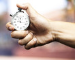 hand holding stopwatch