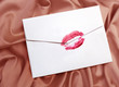 envelope with lipstick kiss