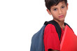 Sulky looking schoolboy