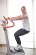 Happy woman ath the gym