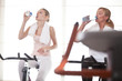 Women drinking water during the training