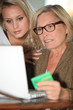 Mother and daughter calculating social security