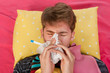 Photo: Very ill man is blowing his nose Very ill man is blowing his nose