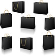 Black shopping bags vector set isolated on white