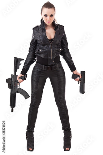 Photo: Woman posing with a guns Woman posing with a guns
