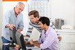 Sales manager demonstrating a point on a computer