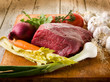 meat with vegetables ingredients over cutting board