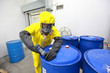 Professional in uniform dealing with chemicals Professional in uniform dealing with chemicals