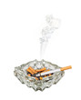 Smoking cigarette in ashtray