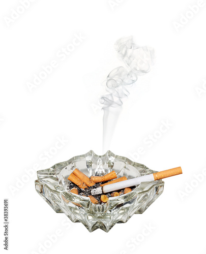 Photo: Smoking cigarette in ashtray Smoking cigarette in ashtray