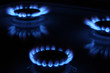 Three flames of a gas stove