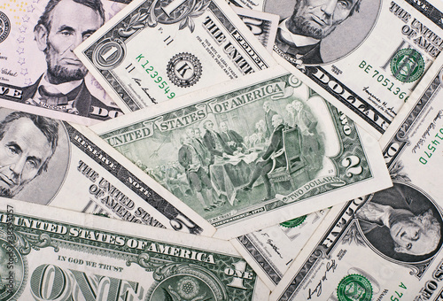 Photo: Background of small dollar bills Background of small dollar bills