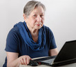 senior woman working on a laptop