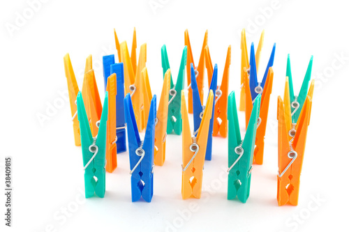 Photo: Color clothes-pegs over white Color clothes-pegs over white