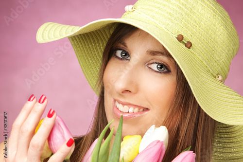 Photo: Beautiful woman with tulips Beautiful woman with tulips