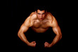 Photo: bodybuilder showing his strength bodybuilder showing his strength