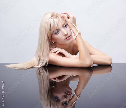 Photo: beautiful girl with pearls beautiful girl with pearls