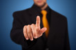 Photo: Businessman pressing an imaginary button Businessman pressing an imaginary button