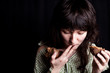 beggar woman eating bread