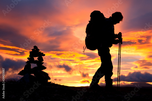 Photo: Hiker on the Way at Sunrise Hiker on the Way at Sunrise