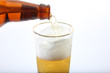 Beer glass and bottle close-up shot Beer glass and bottle close-up shot